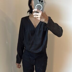 Black bodysuit shirt
Classy for work or going out